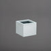 Antwerp Corner Fiberglass Planter in metallic silver against gray background.