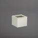 Antwerp Corner Fiberglass Planter in satin beige against gray background.