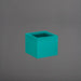 Antwerp Corner Fiberglass Planter in satin seafoam green against gray background.