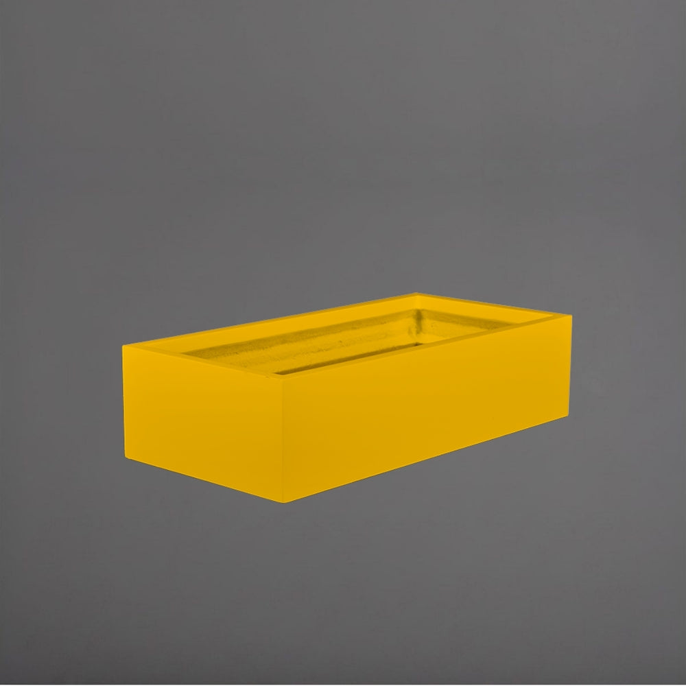 Antwerp Wide Rectangular Fiberglass Planter in gloss saffron against gray background.