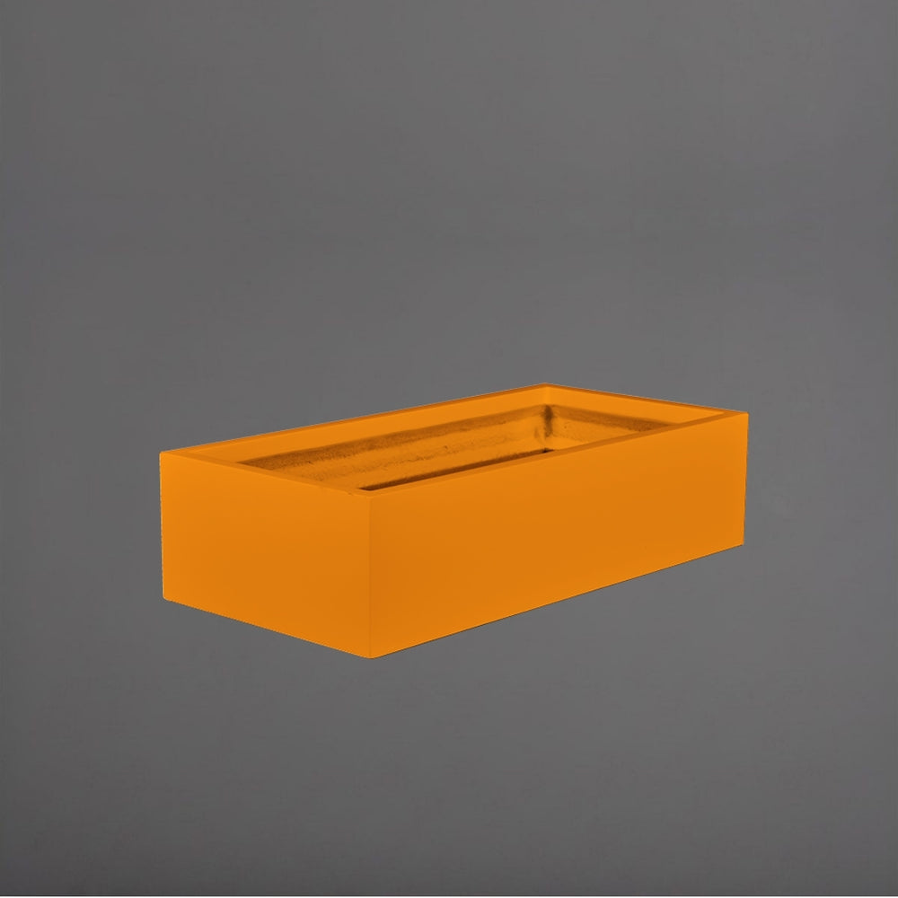 Antwerp Wide Rectangular Fiberglass Planter in gloss tangerine against gray background.