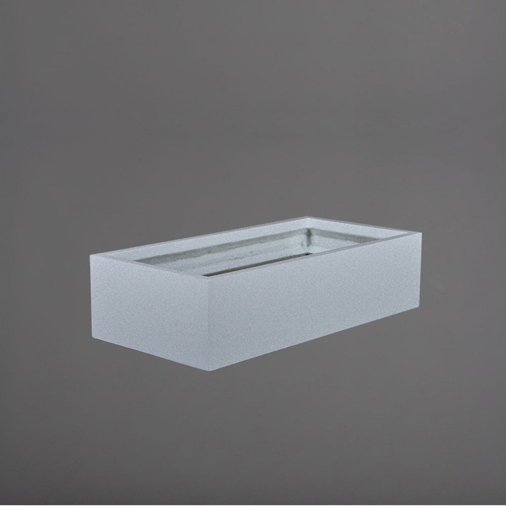 Antwerp Wide Rectangular Fiberglass Planterin metallic silver against gray background.