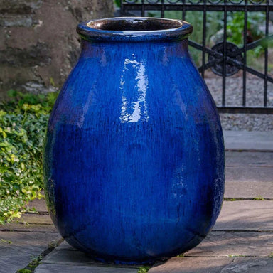 Appia Antica Jar Planter - Riviera Blue - S/1 on concrete in the backyard