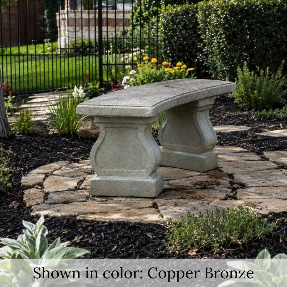 Arles Bench in copper bronze in the garden.