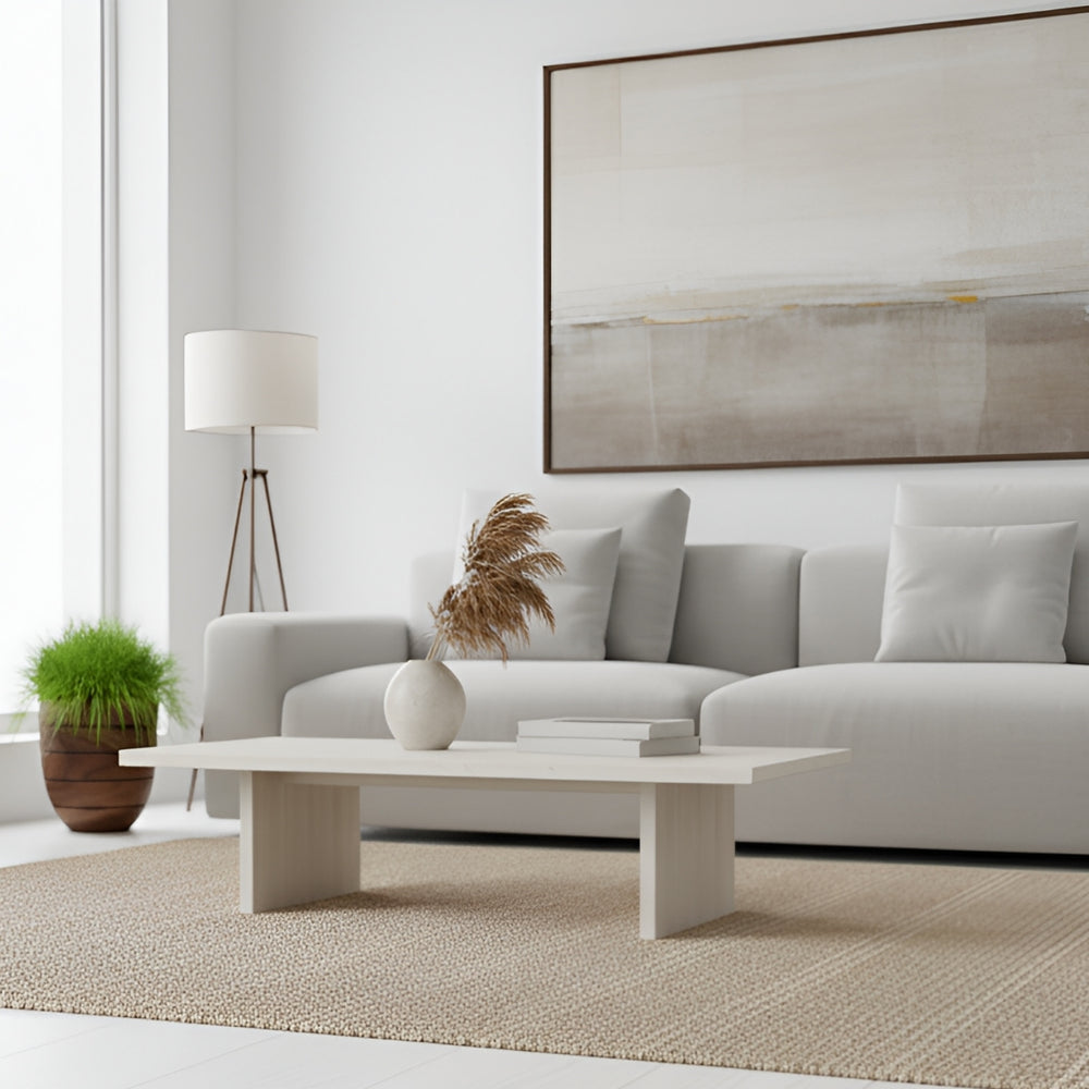 Aspen Round Wood Look Fiberglass Planter filled with plants in the living room.