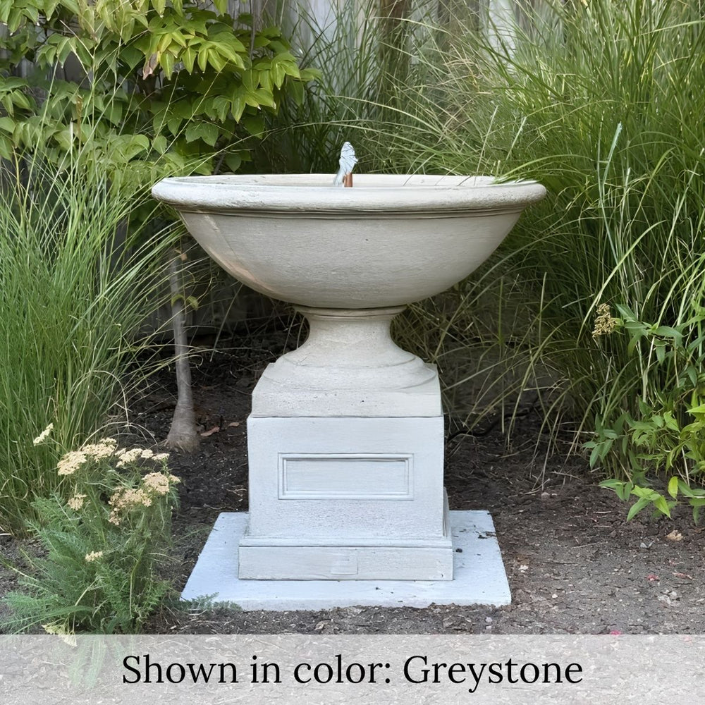 Aurelia Fountain in greystone color in the garden.