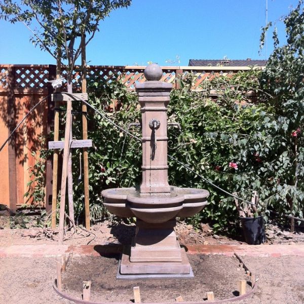 Avignon Courtyard Fountain on concrete in action