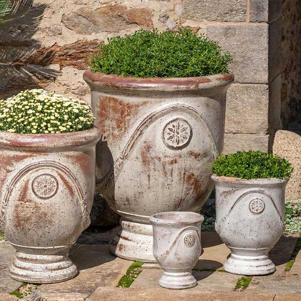 Avignon Planter filled with flowers in the backyard