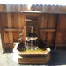 Avignon Wall Fountain in action against wooden fence. 