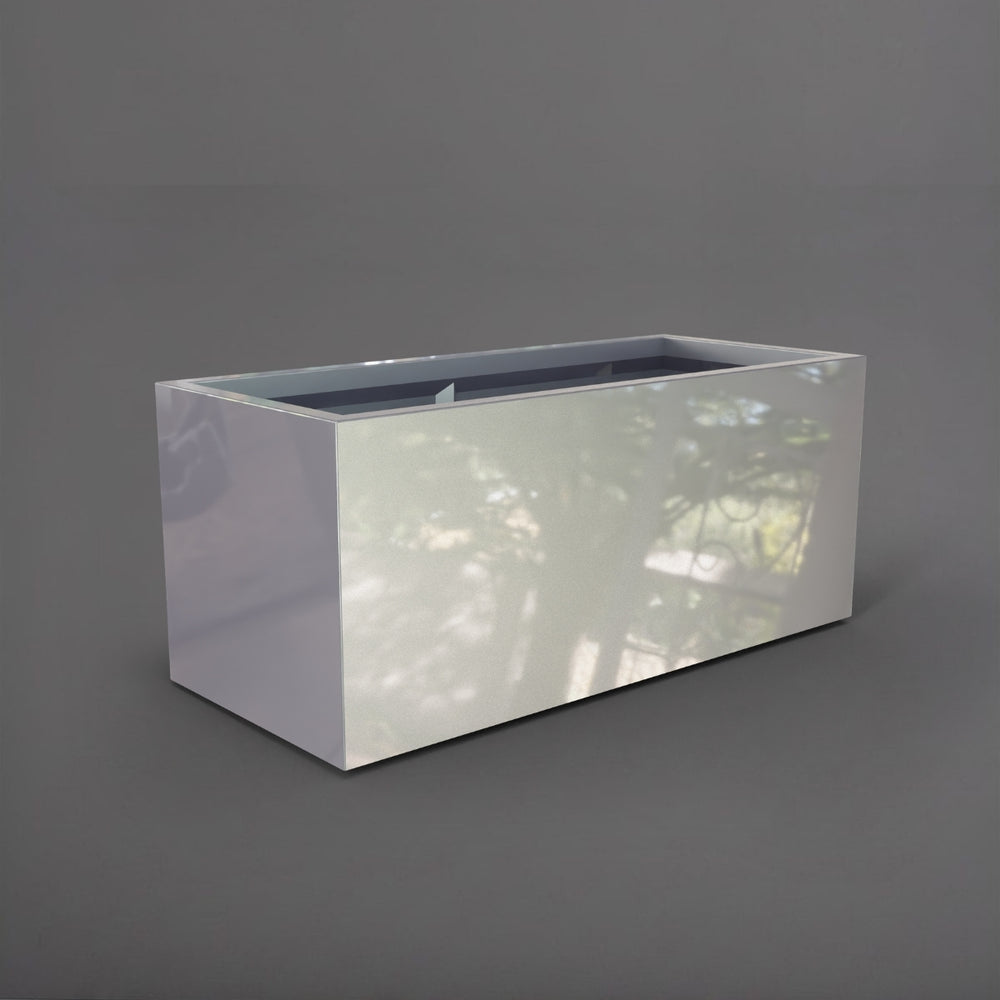 Badalona Rectangle Fiberglass Planter in metallic silver against gray background.