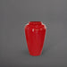 Bara Jar Tall Tapered Fiberglass Planter in gloss red against gray background.