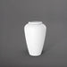 Bara Jar Tall Tapered Fiberglass Planter in matte bright white against gray background.