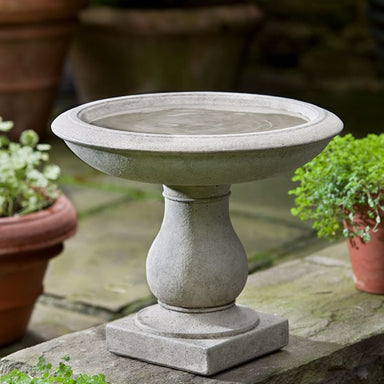 Beauvoir Birdbath on ledge in the backyard