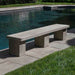 Biscayne Bench on concrete beside swimming pool sideview upclose