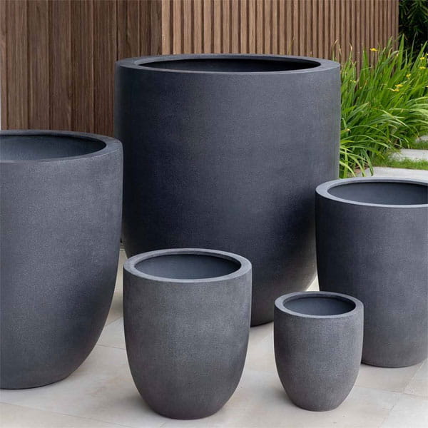 Bradford Planter in charcoal premium lite on concrete.