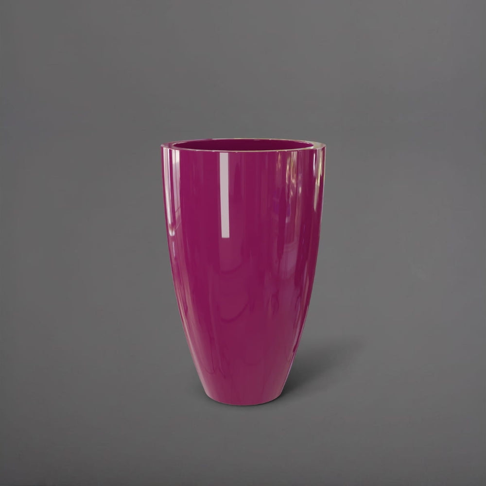 Brannan Tapered Round Fiberglass Planter in gloss eggplant against gray background.