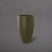 Brannan Tapered Round Fiberglass Planter in matte bronze against gray background.