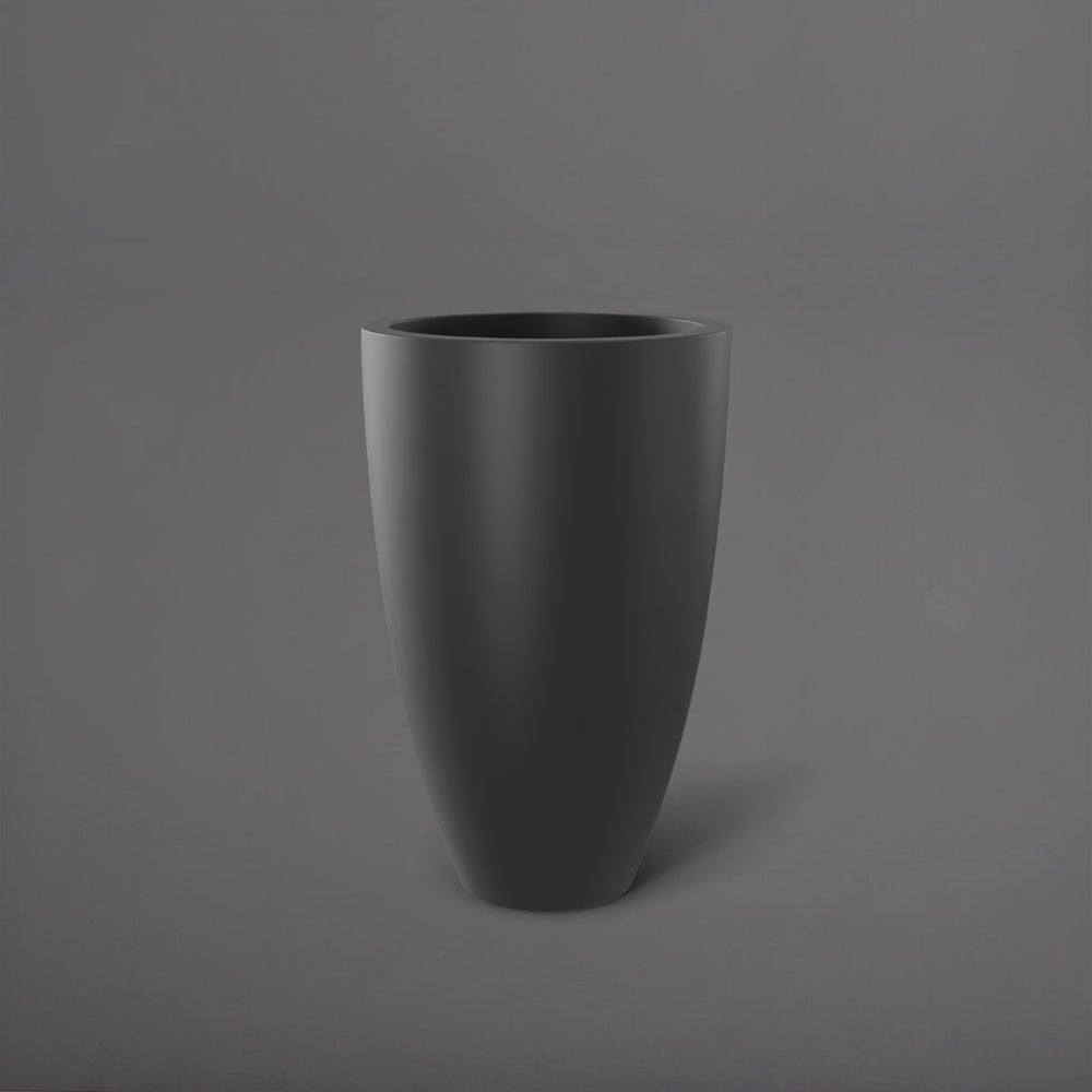Brannan Tapered Round Fiberglass Planter in matte charcoal against gray background.