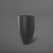 Brannan Tapered Round Fiberglass Planter in matte charcoal against gray background.