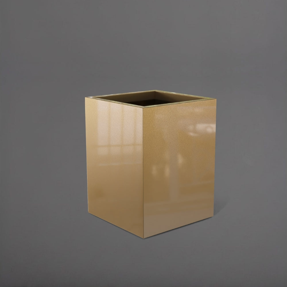 Brisane Tall Corner Fiberglass Planter in gloss metallic gold against gray background.