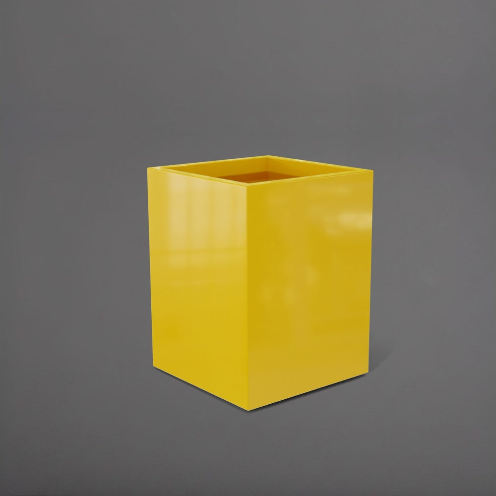 Brisane Tall Corner Fiberglass Planter in gloss saffron against gray background.