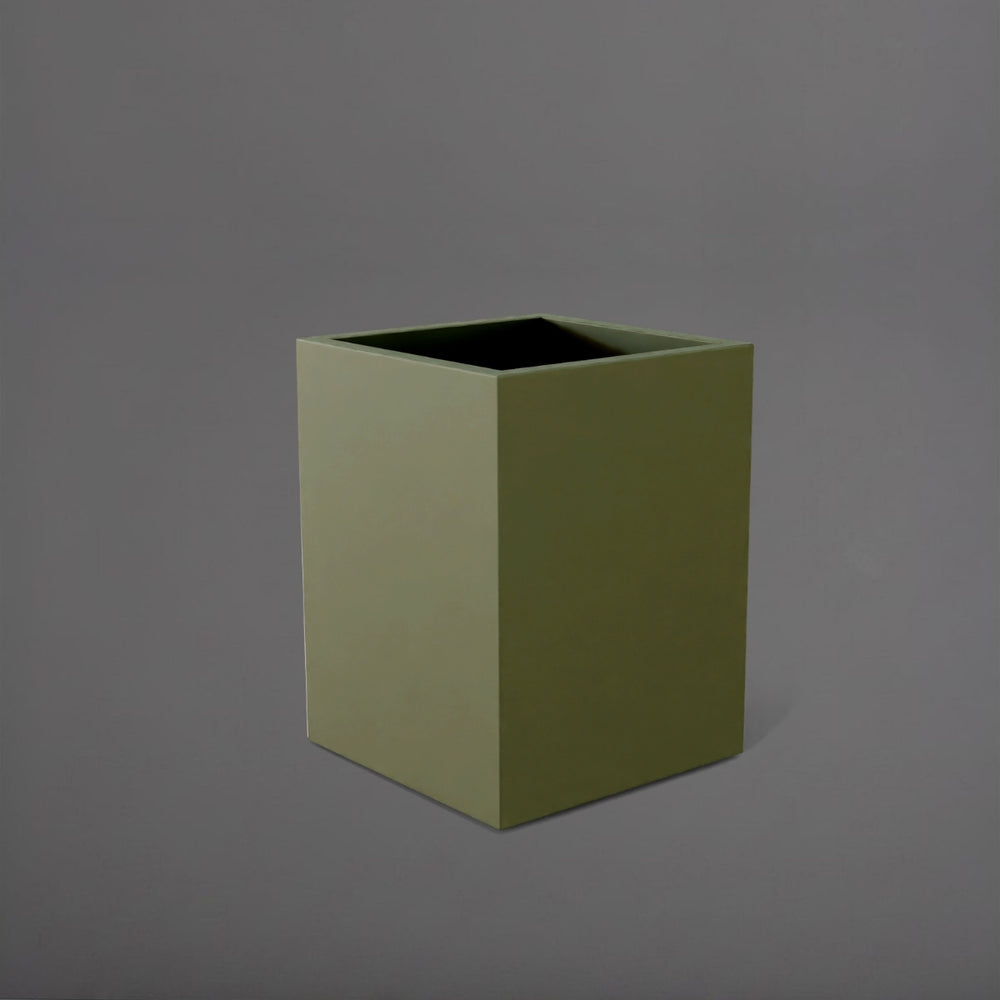 Brisane Tall Corner Fiberglass Planter in matte bronze against gray background.
