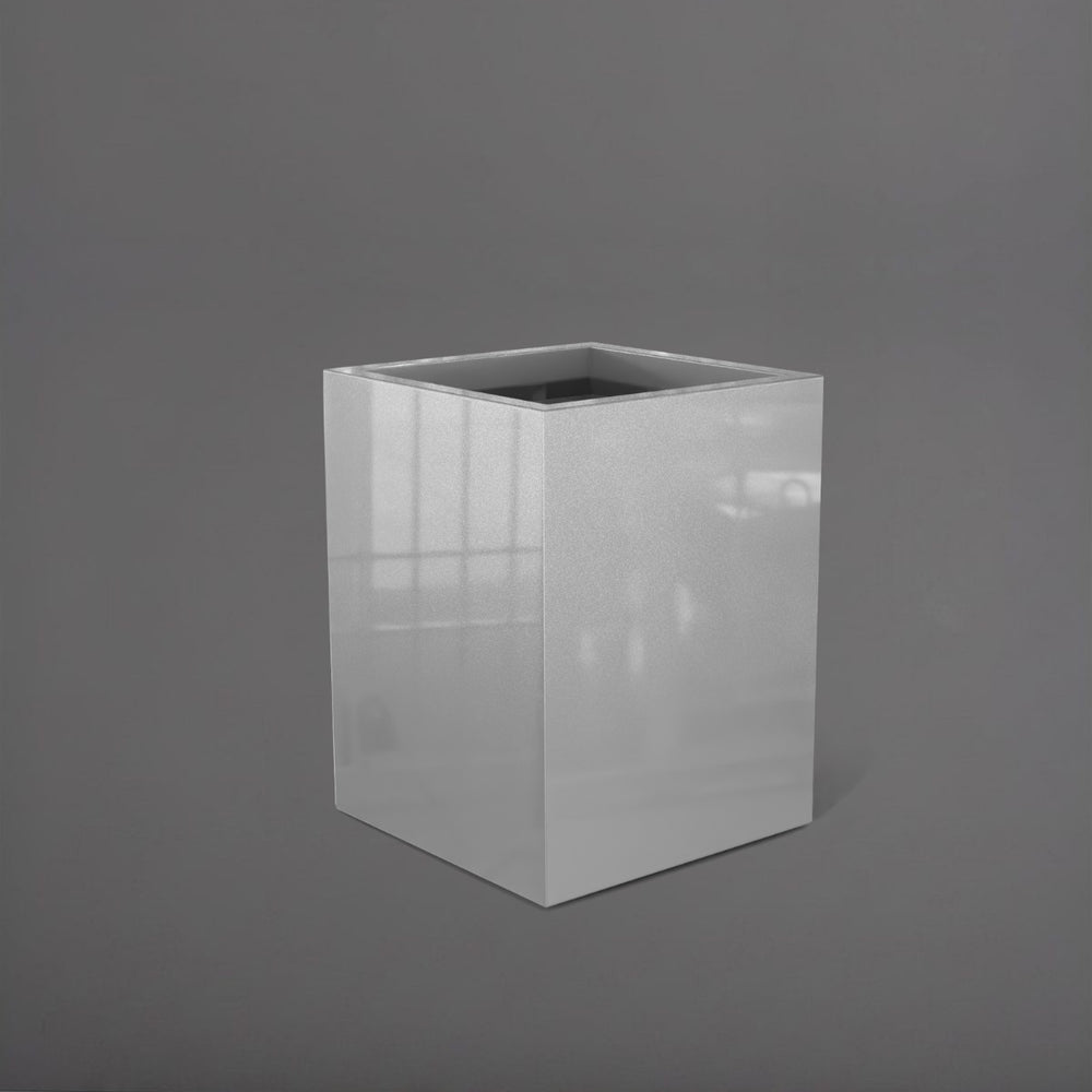 Brisane Tall Corner Fiberglass Planter in metallic silver against gray background.