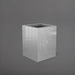 Brisane Tall Corner Fiberglass Planter in metallic silver against gray background.