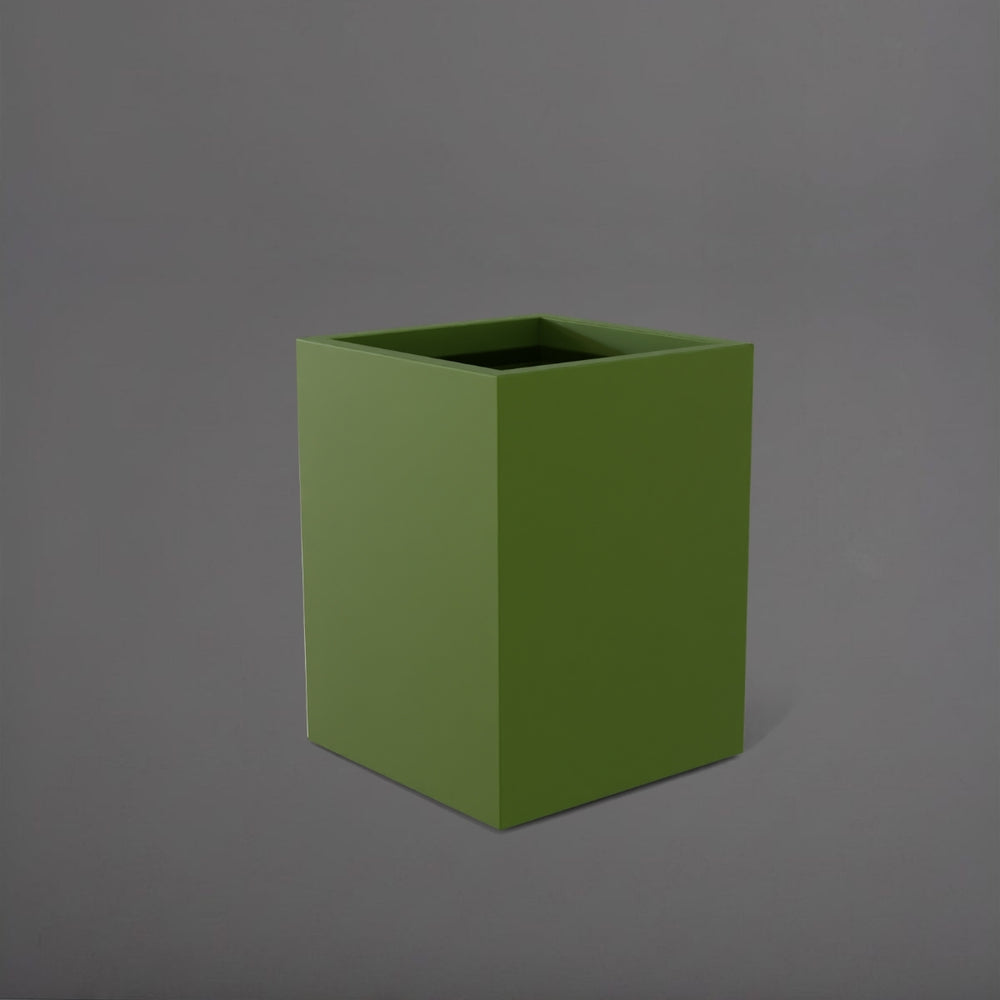 Brisane Tall Corner Fiberglass Planter in satin green against gray background.