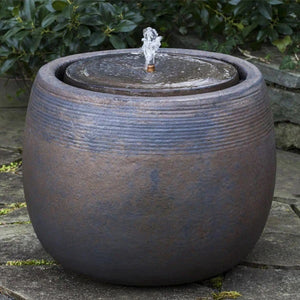 Bronze Boden Fountain Bubbler in action on stone patio