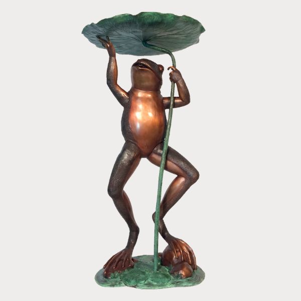 Bronze Frog Holding Lily pad fountain against gray background