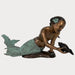 Bronze girl mermaid holding shell sculpture against gray background