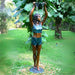 Bronze Standing Lady Fountain Sculpture on grass in the backyard