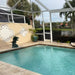 Bronze Three Dolphins Fountain Sculpture in action on the swimming pool.