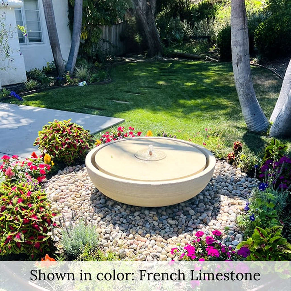 Campania Large Girona Fountain in french Limestone in rock garden.
