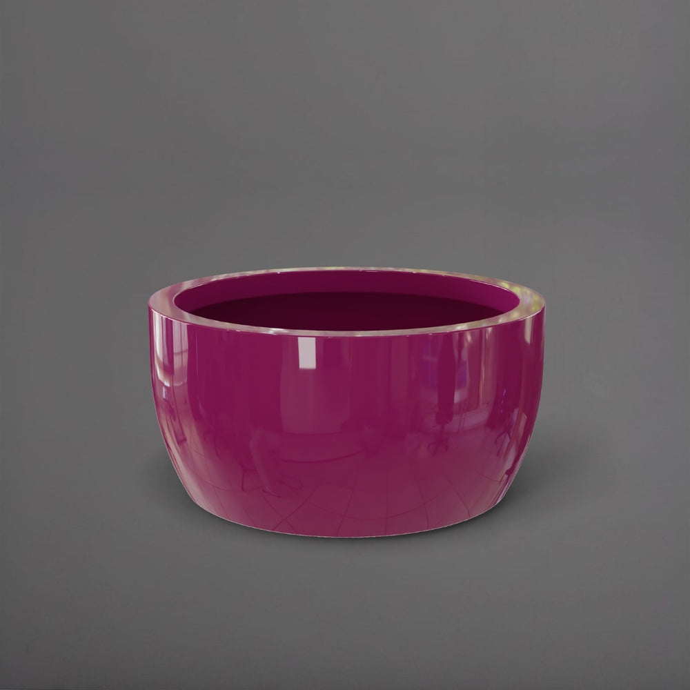 Casablanca Bowl Fiberglass Planter in gloss eggplant against gray background.