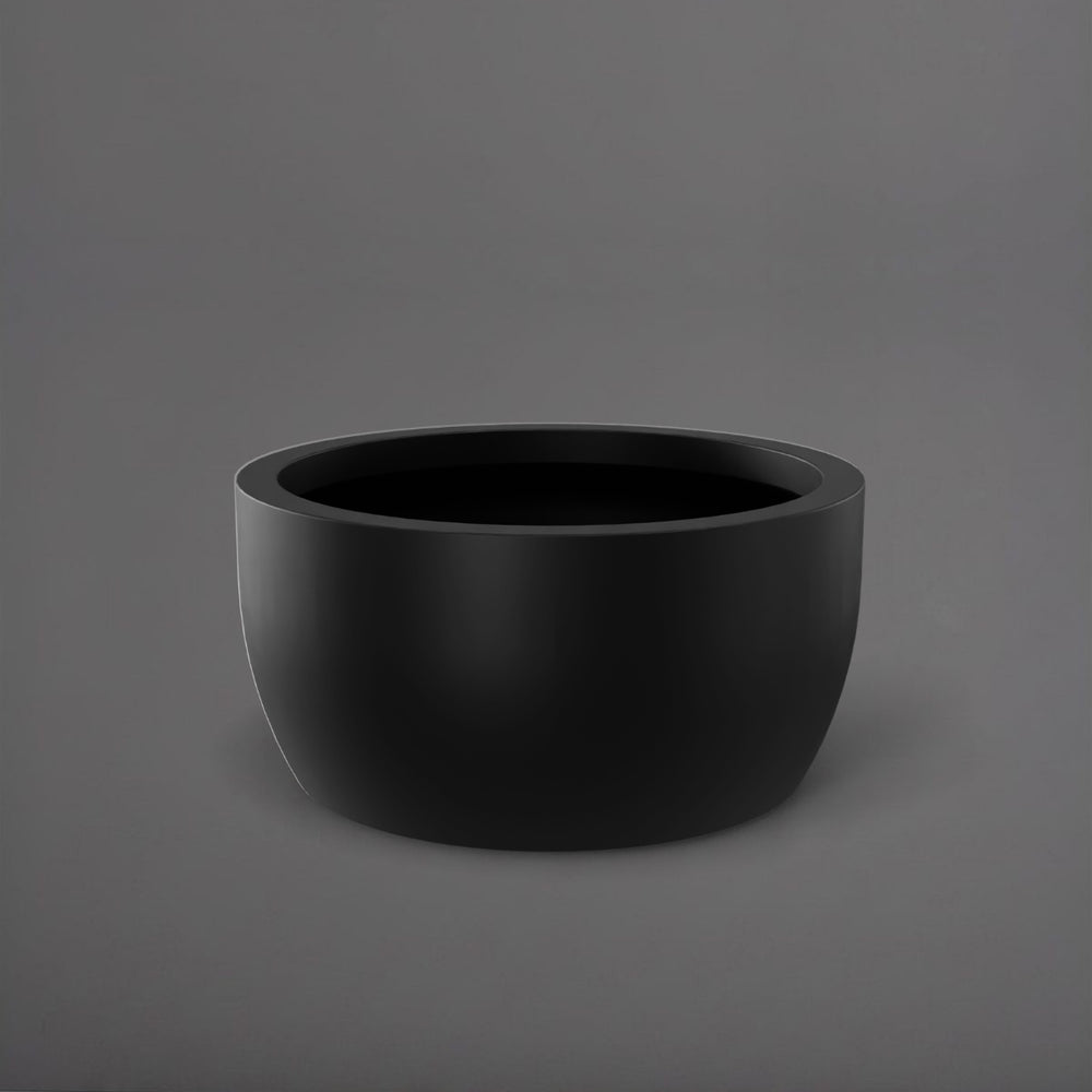 Casablanca Bowl Fiberglass Planter in matte black against gray background.