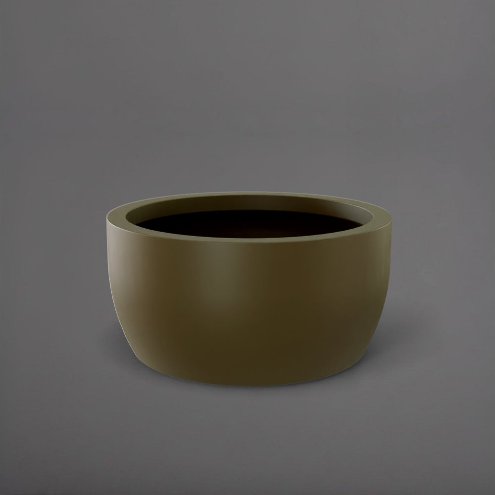 Casablanca Bowl Fiberglass Planter in matte bronze against gray background.