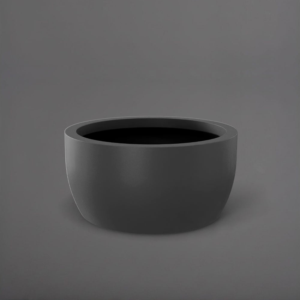 Casablanca Bowl Fiberglass Planter in matte gunmetal against gray background.