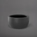 Casablanca Bowl Fiberglass Planter in matte gunmetal against gray background.