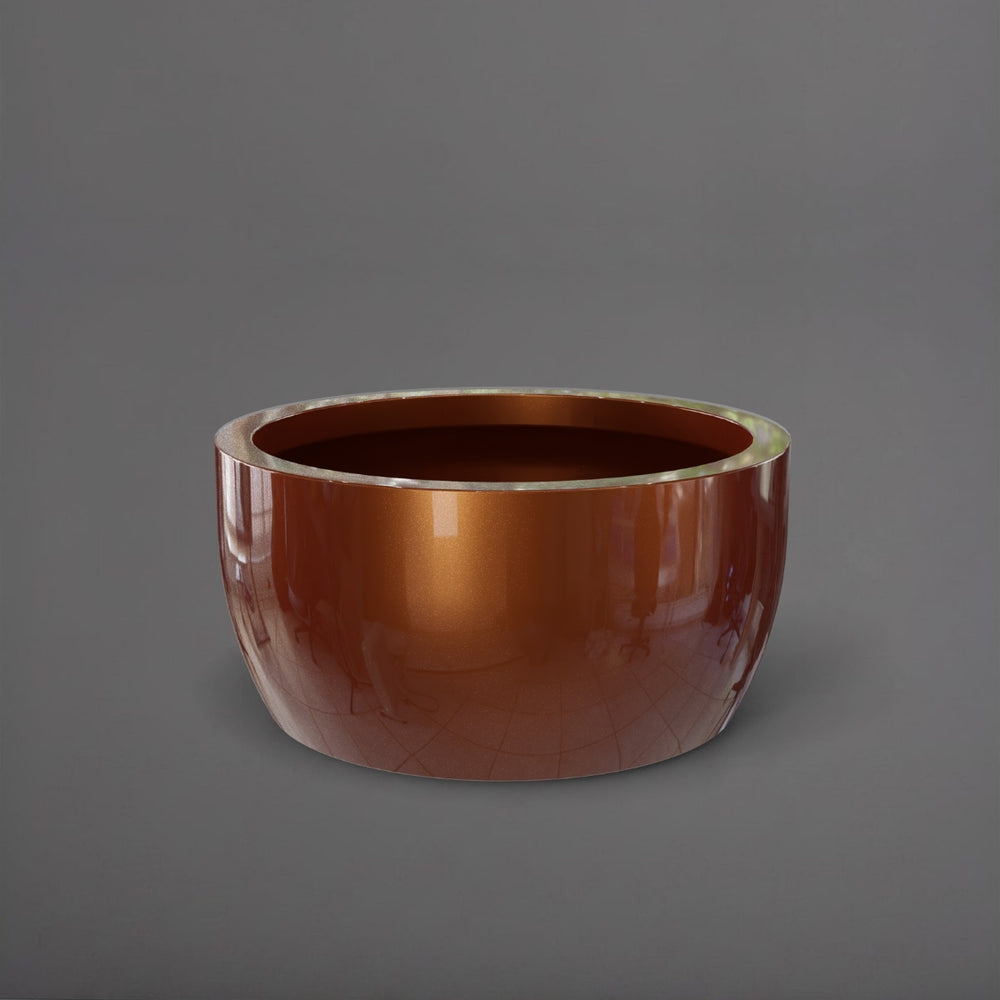 Casablanca Bowl Fiberglass Planter in metallic bronze against gray background.