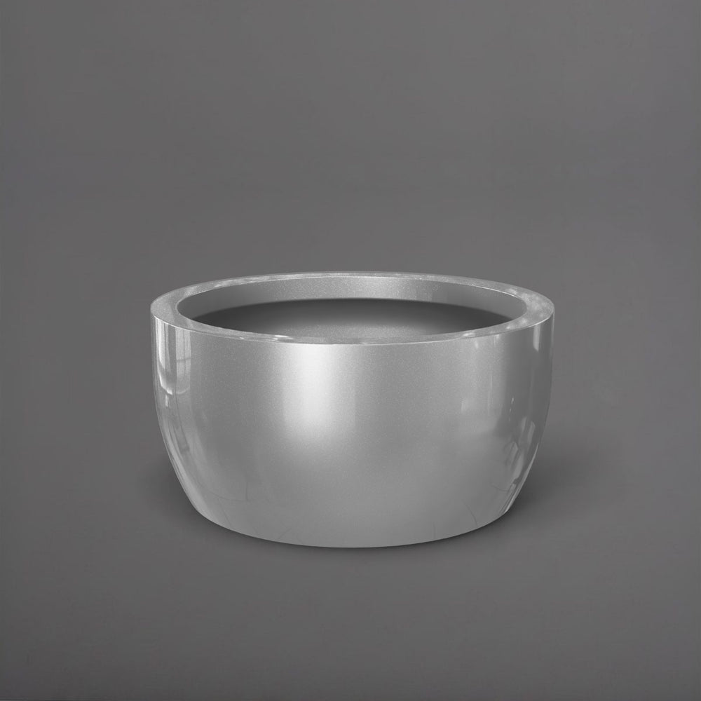 Casablanca Bowl Fiberglass Planter in metallic silver against gray background.