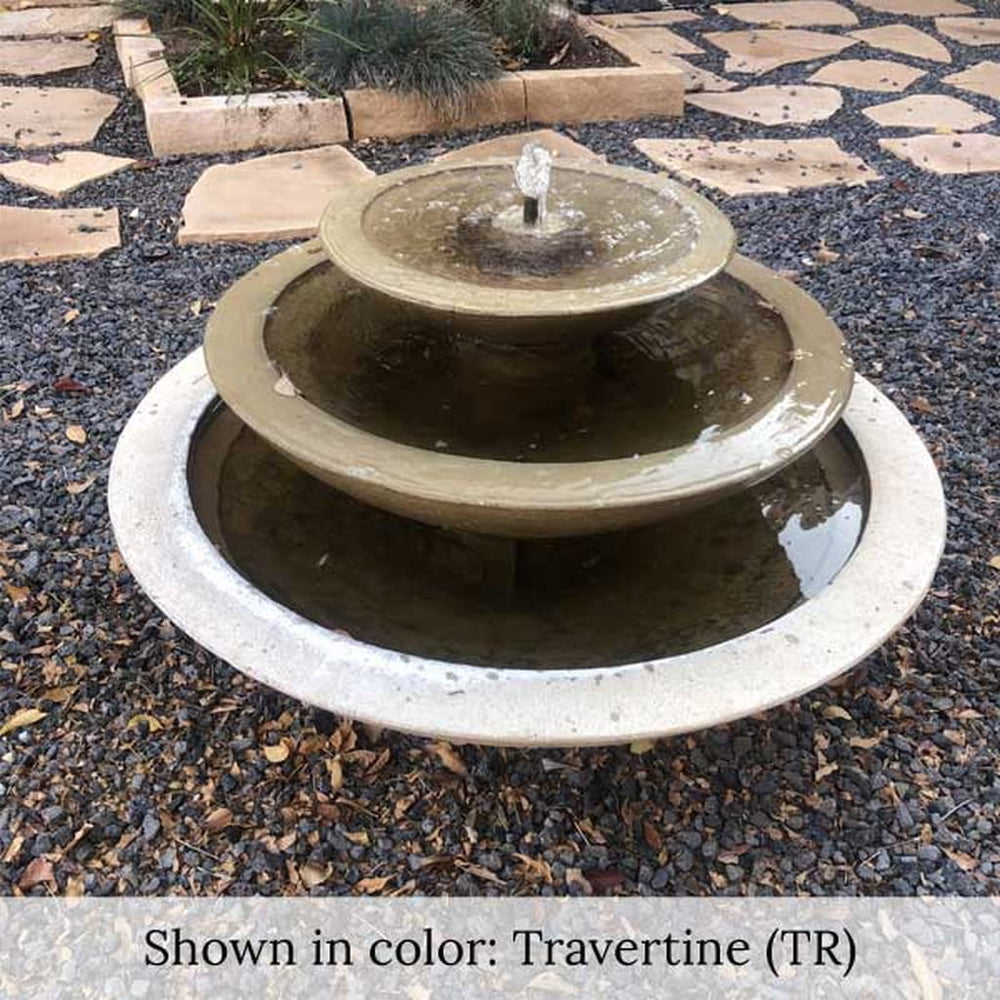 Cascade Fountain in Travertine running on concrete paver.