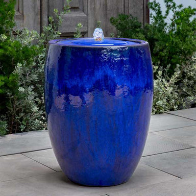 Casco Fountain - Riviera Blue - S/1 on concrete with plants background