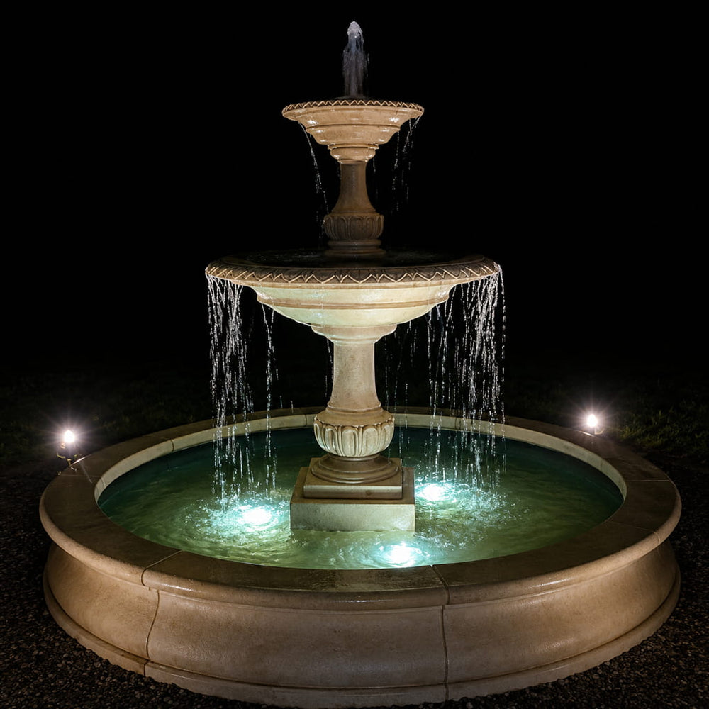 Charleston in Basin in french limestone in the backyard at night.