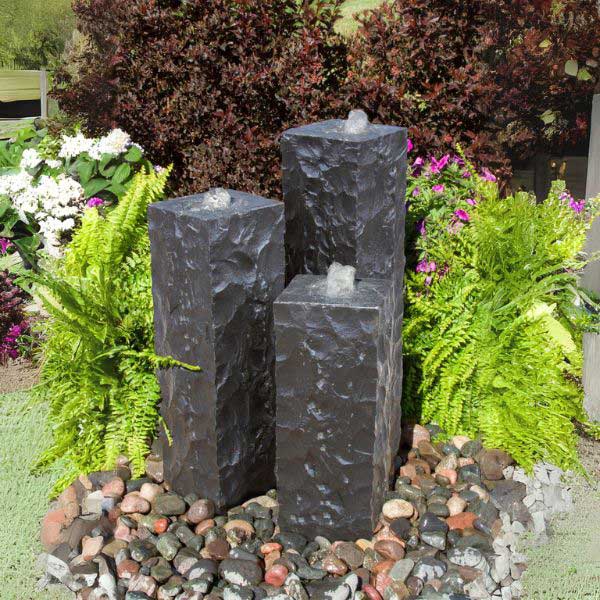 Chiseled Black Basalt Fountain Kit in action in the backyard