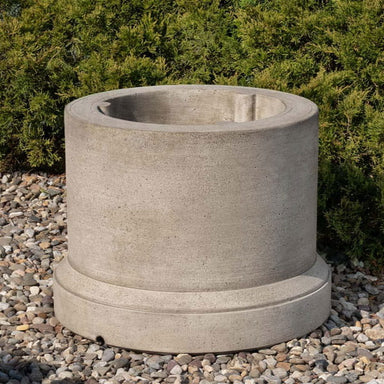 Circular Pedestal 16 inch on gravel in the backyard.