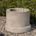 Circular Pedestal 16 inch on gravel in the backyard.