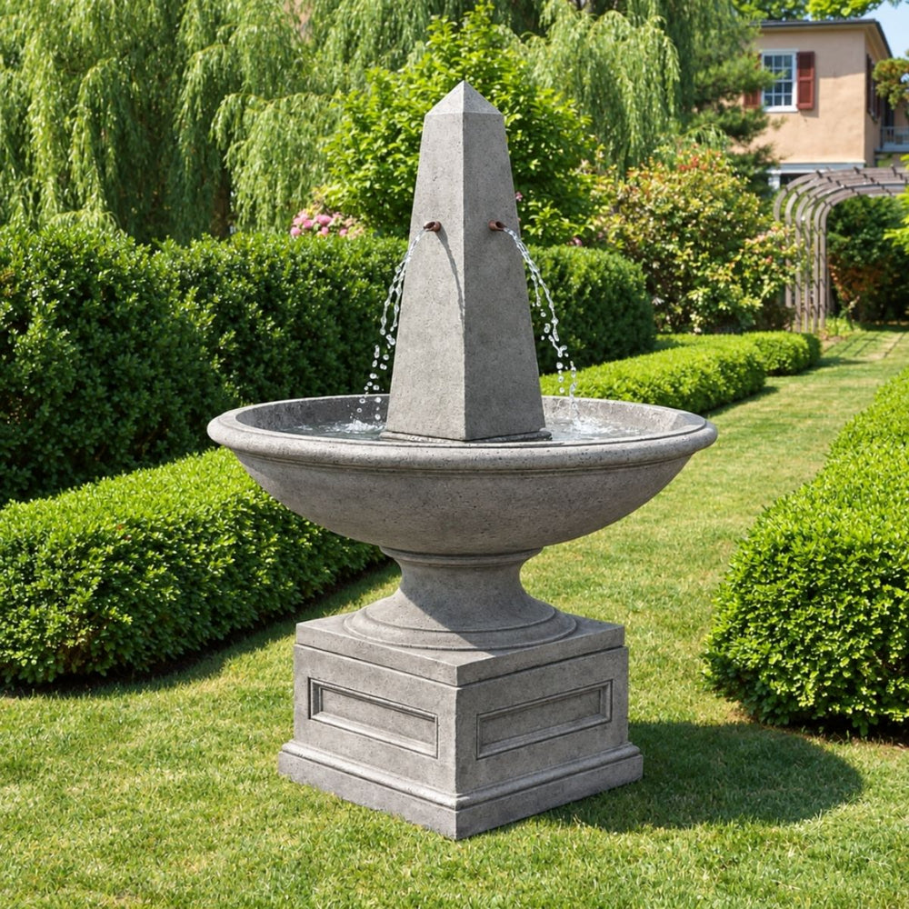 Condotti Obelisk Fountain in action in the garden.