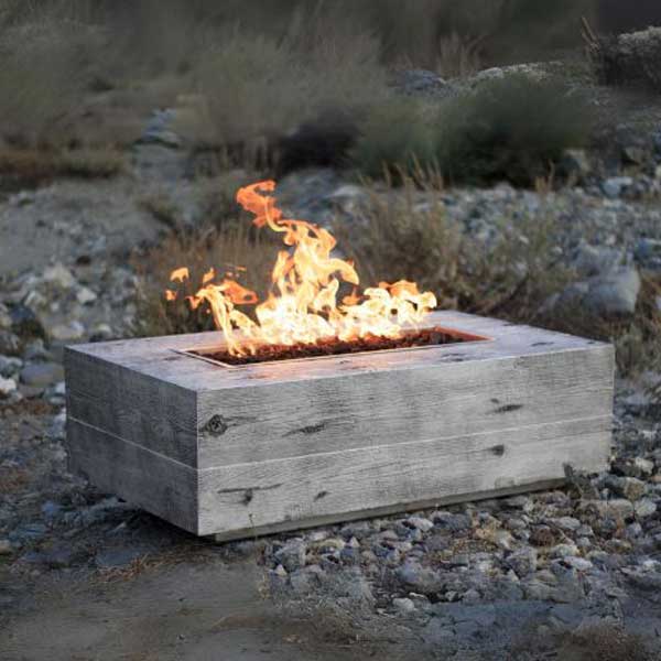 Coronado Wood Grain Fire Pit in the backyard